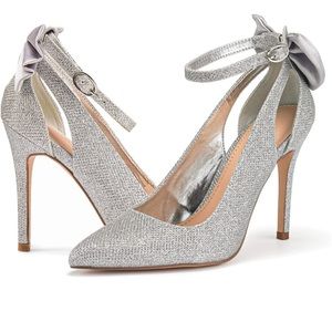 Bow heels. Silver sparkle. Worn once for 2 hours